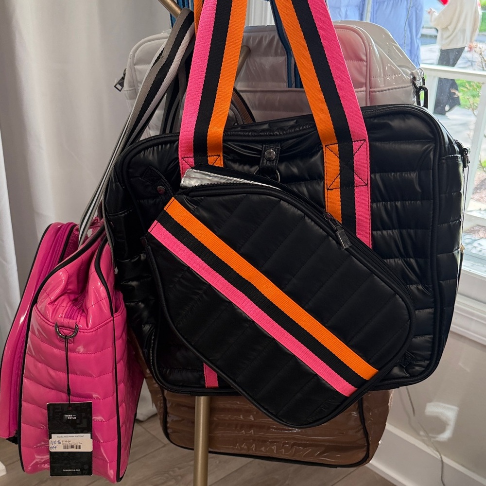 THINK ROYLN Quilted Black Pickleball bag  with Pink & Orange Stripe Strap
